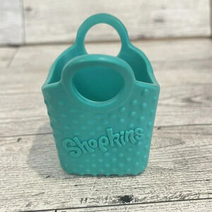2013 McDonald's Happy Meal toy Shopkins teal blue green shopping bag basket Only